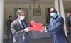 France Ambassador to Zimbabwe, His Excellency Laurent Chevalier (right) and PCP chairperson, Prof Eddie Mwenje  holding a folder with signed MoU documents,